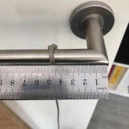 Un fil sur la poignée